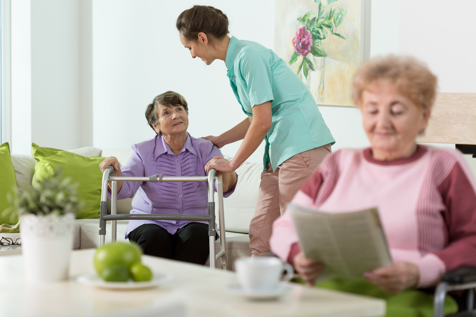 Disabled senior women staying in care home